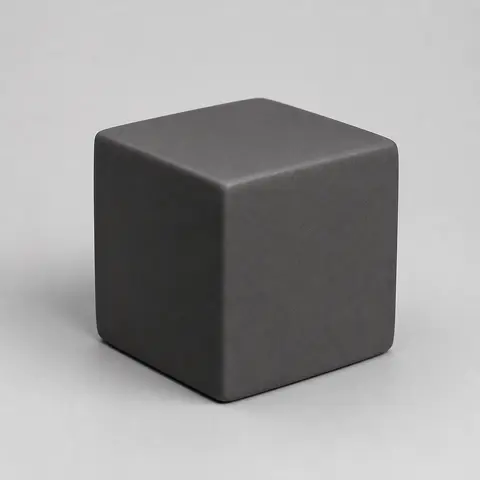 Minh họa cho “Độ phản chiếu”: a matte charcoal ceramic cube with soft diffuse highlights and no mirror-like reflections.